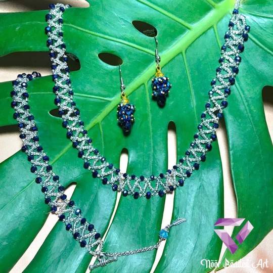 Cross stitched beaded set