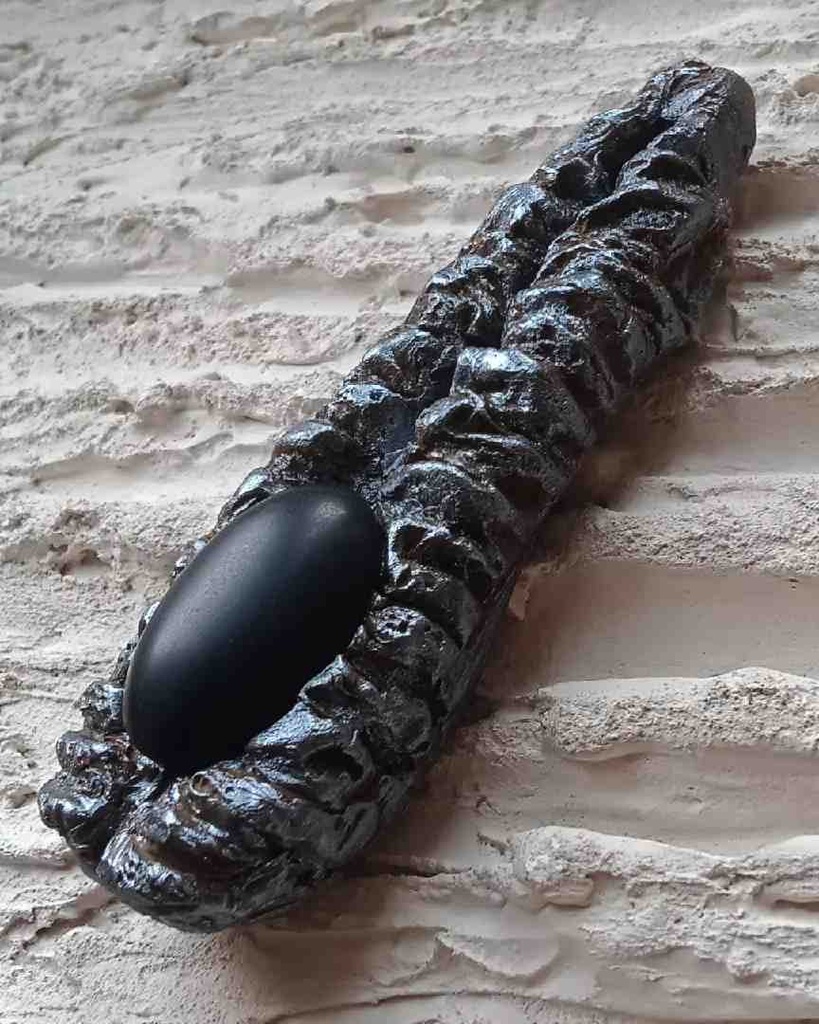 Hand sculpted pendant necklace.