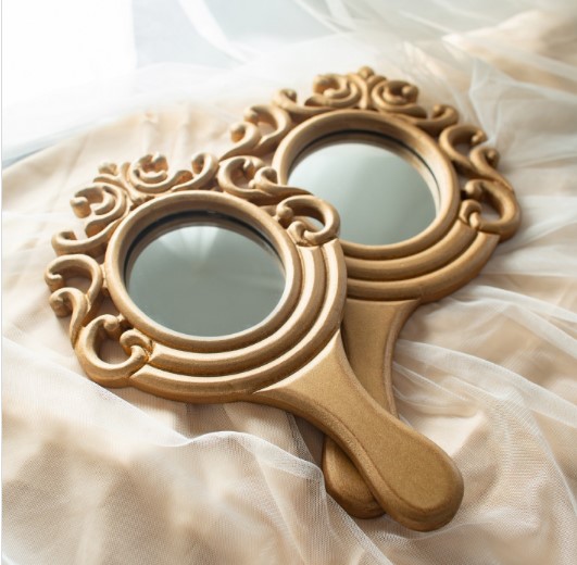 Hand mirror gold coated