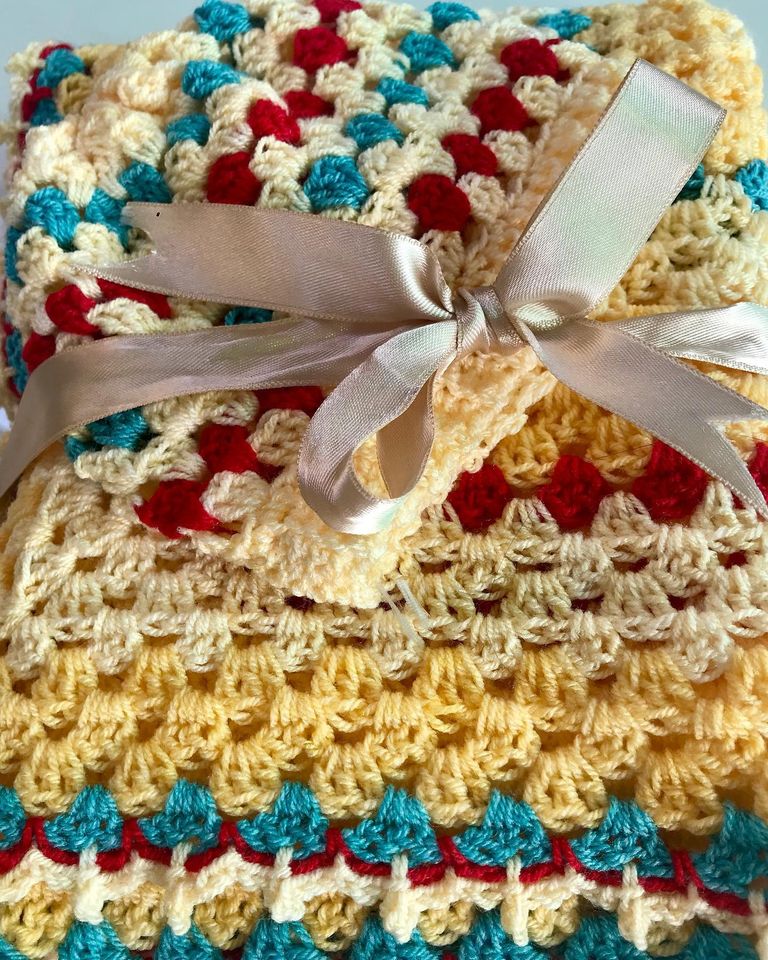 baby blanket and a baby cap